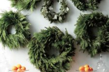 02 a gallery of wall wreaths to highlight your mantel or home bar at the party