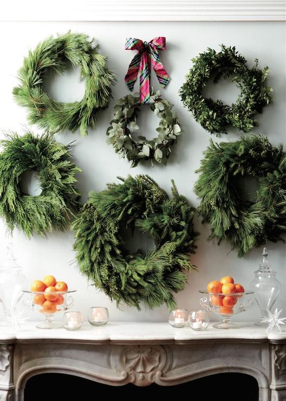 a gallery of wall wreaths to highlight your mantel or home bar at the party