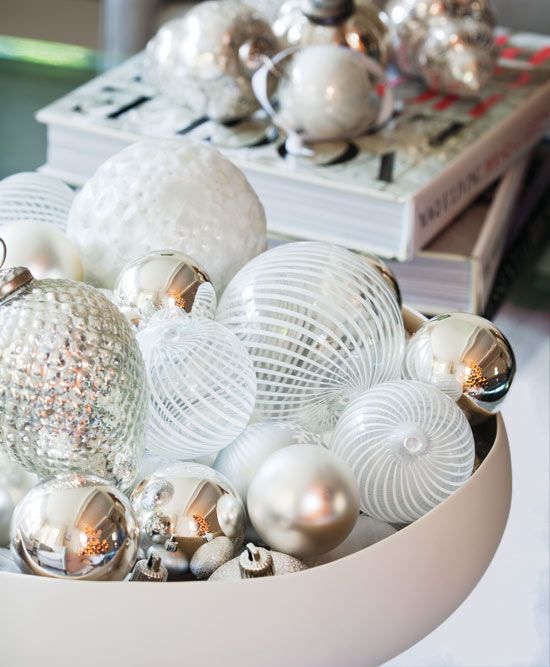 a simple glam display with pearly and shiny ornaments in a bowl