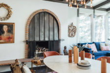 04 A metal and brick built-in hearth and a wooden slab bench covered with faux fur make the space amazing