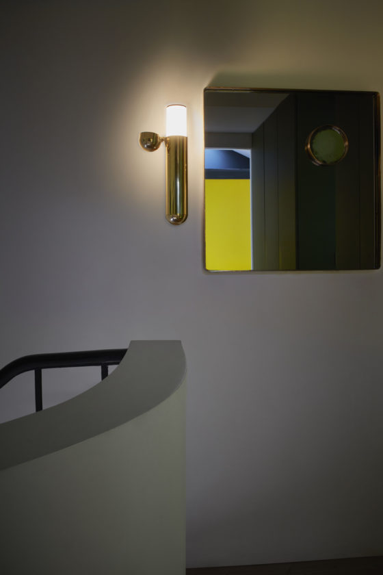 ISP wall lamp designed by Ilia Potemine looks shiny and bold and reminds of a capsule