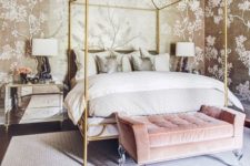 04 gold floral wallpaper, a pink upholstered bench and brass bed framing