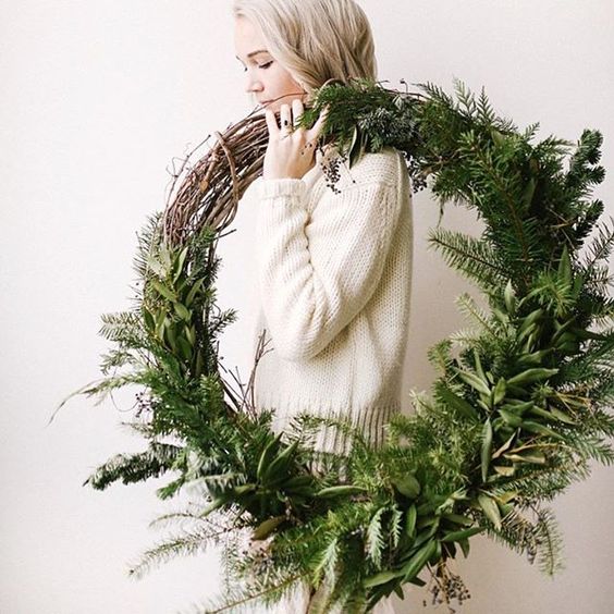 a lush grapevine and evergreen wreath is ideal for Christmas, both indoors and outdoors