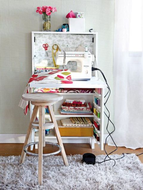 a small sewing nook in a cabinet can be hidden any time and won't take much space