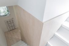 06 The staircase is whitewashed, and the wood is light-colored too to create an airy feeling