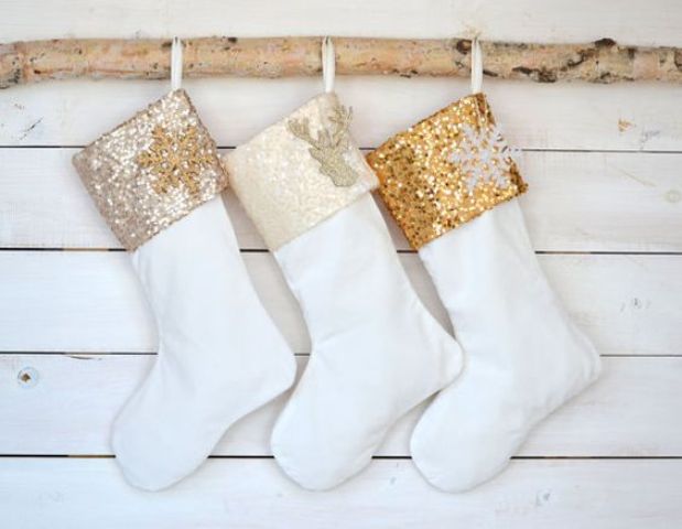 white stockings with cream, champagne and gold sequin tops and deer and snowflake appliques