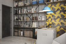 07 The home office features industrial lamps and lots of storage shelves that take the whole wall