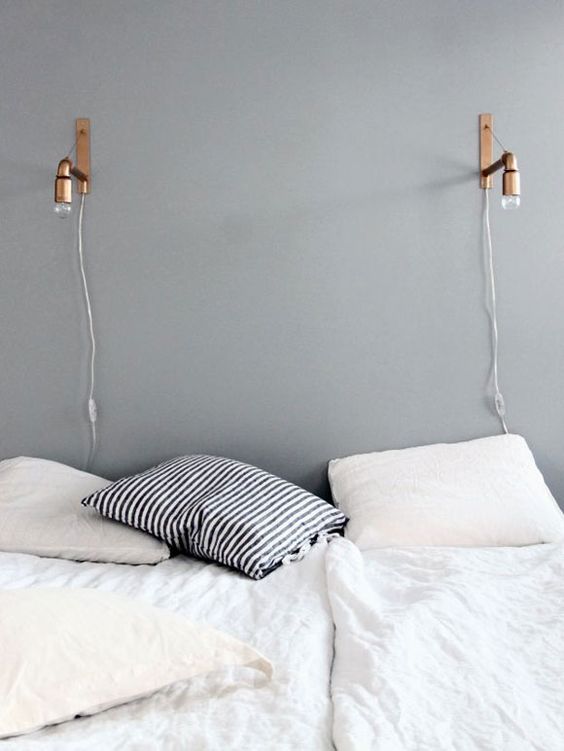 an industrial copper sconce is a great idea for lots of bedrooms and they add a chic touch