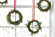window christmas decor with evergreen wreaths