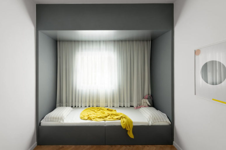 Two kids can sleep here, in this built-in bed, so the child can invite guests