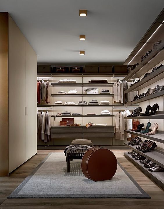 a luxurious modern closet with open shelving and a large wardrobe is great for both men and women