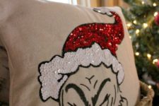 09 a fun Grinch pillow in red and white sequins looks super whimsy and bold and you can make it yourself