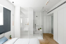 10 The master bedroom features a shower space integrated right into the room