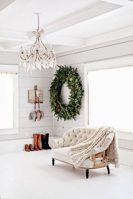 a large rustic evergreen wreath with large pinecones will make a statement in any space