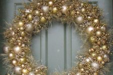 10 a mixed metals Christmas wreath in silver, gold and champagne colors