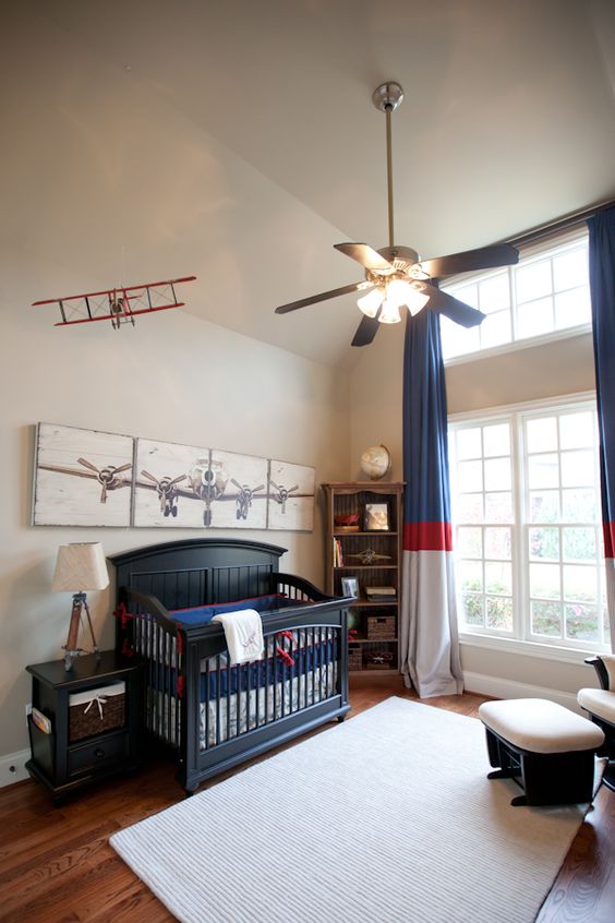 an aviation-themed nursery for a boy, navy, red and white for the color scheme