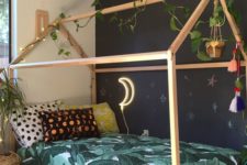 11 a chalkboard wall by the bed encourages creativity and looks very chic