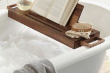 13 a comfy bathroom shelf is great for reading and having a drnk while taking a bath