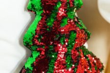 13 a reverse sequin red and emerald sequin Christmas tree pillow is sure to catch an eye