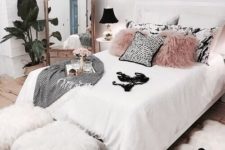 13 faux fur pillows, stools and a rug make the space adorably girlish