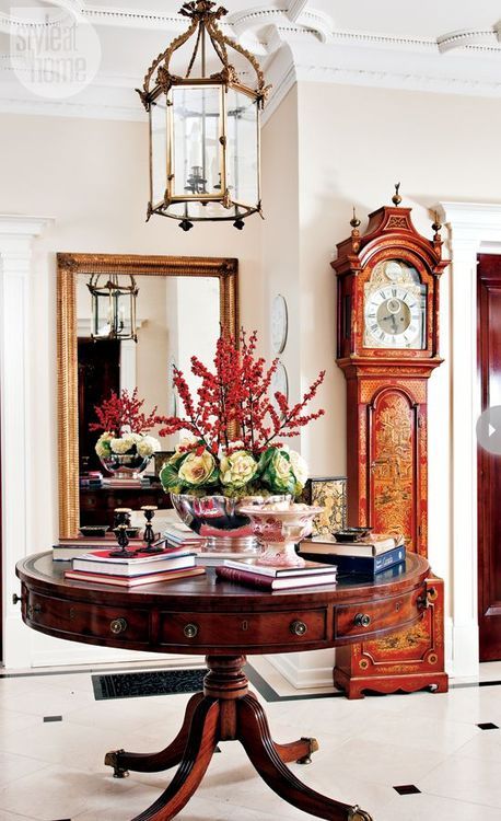 a gorgeous vintage redwood table in the entryway is a fantastic idea for a luxurious interior