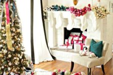 14 an oversized glam fireplace garland made of ornaments of different colors and a matching display