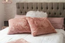 15 pink faux fur pillows and a blanket are sure to make your sleeping amazing