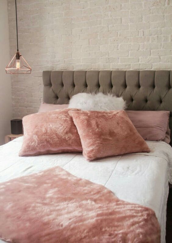 pink faux fur pillows and a blanket are sure to make your sleeping amazing