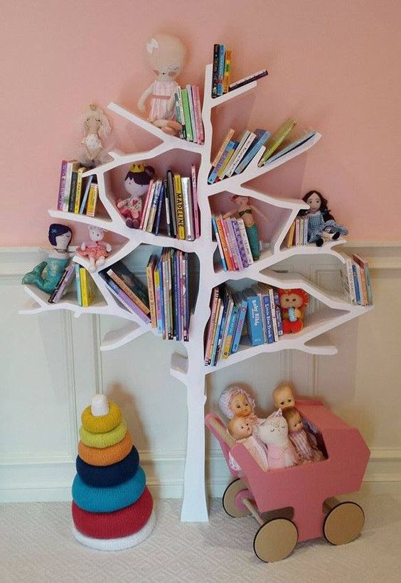 a tree-shaped bookshelf serves as a book storage piece and a toy at the same time