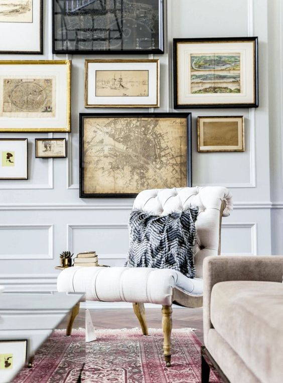 the panel molding makes these very light grey walls really stand out and look chic
