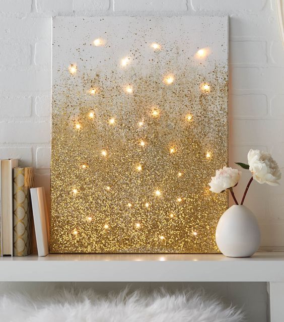 a glitter gold artwork with lights is an easy DIY to make