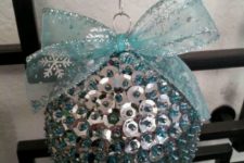 20 a silver and light blue sequin ball ornament with a large light blue ribbon bow