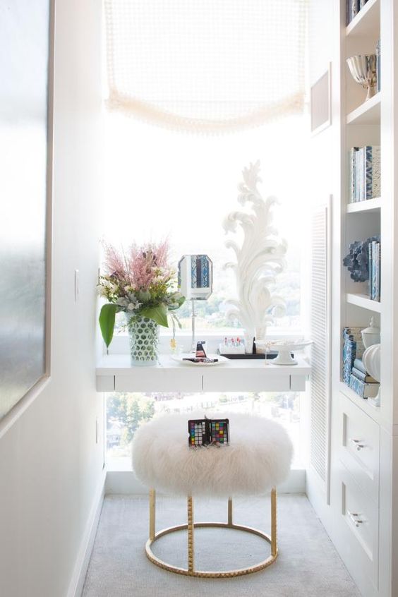 a vanity built in next to the window is a great idea to get much natural light