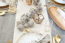 20 an eye-catchy festive tablescape with silver, gold and copper touches looks cool and wow