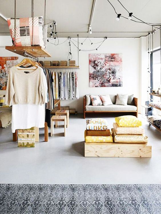 a large open space with cool makeshift closets used for space separating