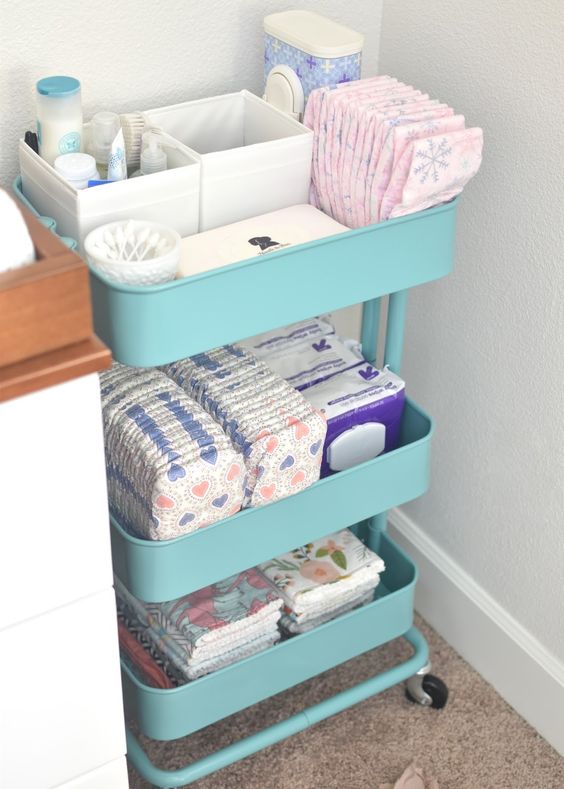 an IKEA cart turned into a changing table storage is a smart idea
