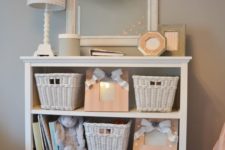 22 a whitewashed dresser with baskets to store all the stuff your kids need