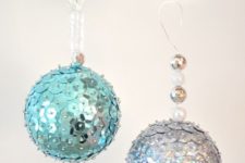 22 cute shiny blue and silver sequin ornaments with additional beads for Christmas