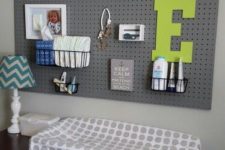 23 a pegboard over the changing table is a great idea to accomodate a lot of storage