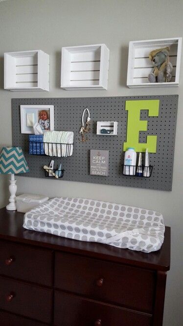A pegboard over the changing table is a great idea to accomodate a lot of storage