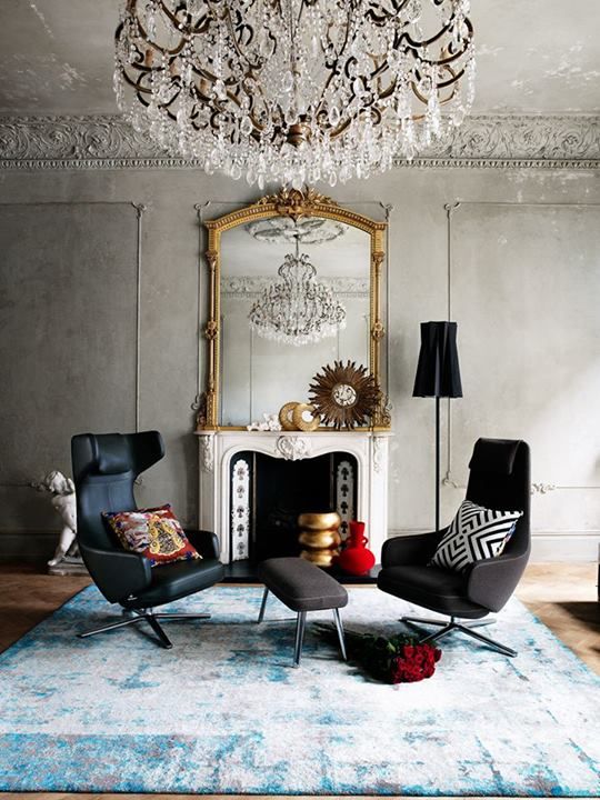 vintage glam with a dramatic effect, a large vintage mirror and a crystal chandelier for a cool look