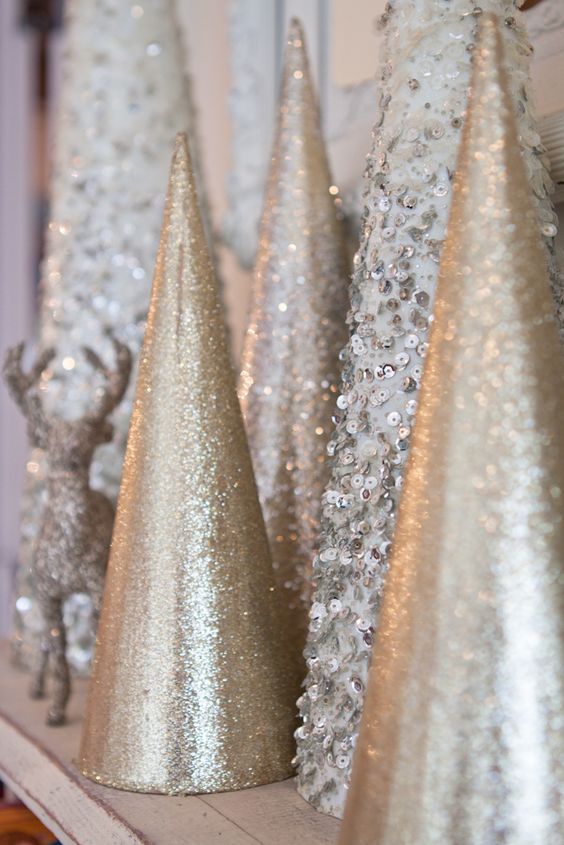 shiny Christmas tree cones of champagne glitter paper and silver sequins for a shiny touch