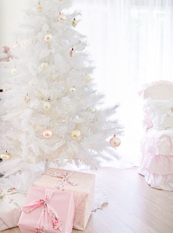 a pure white Christmas tree with pastel ornaments will bring a vintage glam feel to your space