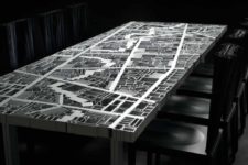 01 Baghadad table is a unique piece that features the city map made of aluminum details