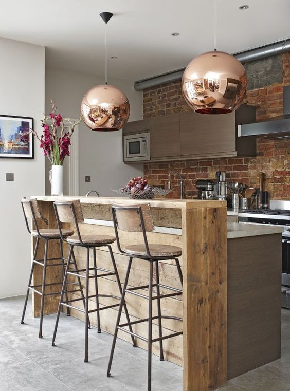 large copper bubble lamps soften the space and make a glam statement