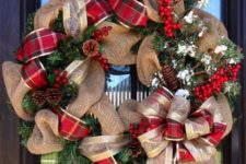 03 a burlap wreath with plaid and gold ribbon, pinecones, berries and evergreens for a Christmas door