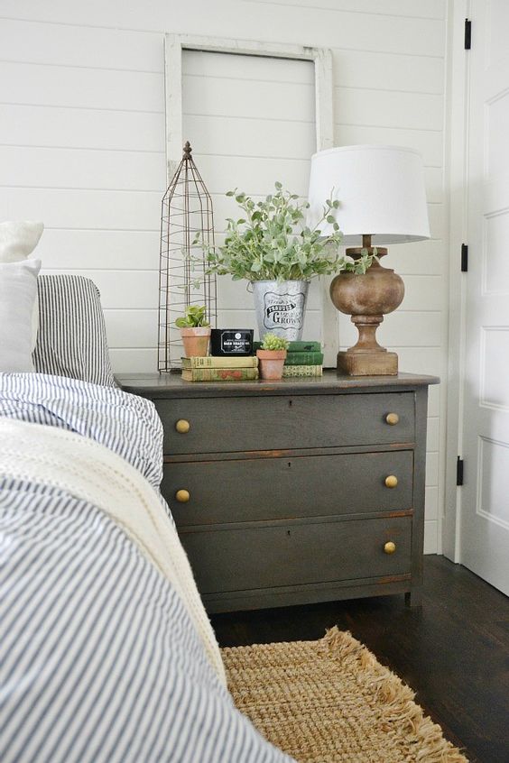 a rustic grey dresser to add a cozy feel and give you mcuh storage space