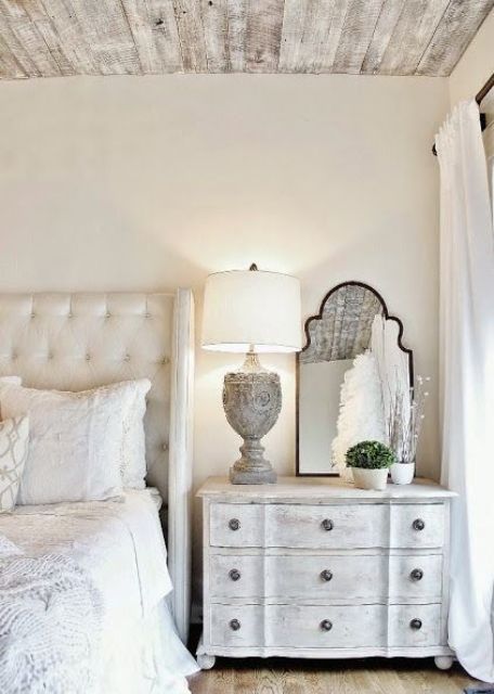 a Provence bedroom can be completed with a whitewashed dresser of a vintage look
