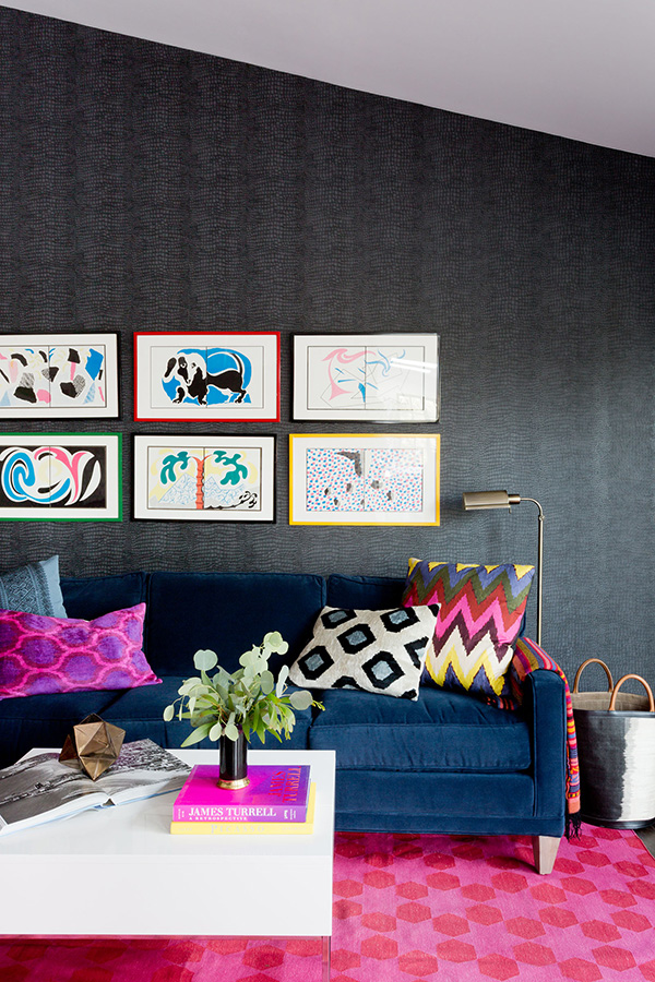 The second living room shows off bold furniture and textiles and artworks