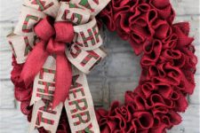 06 a red burlap wreath with large bows with letters looks bold and festive